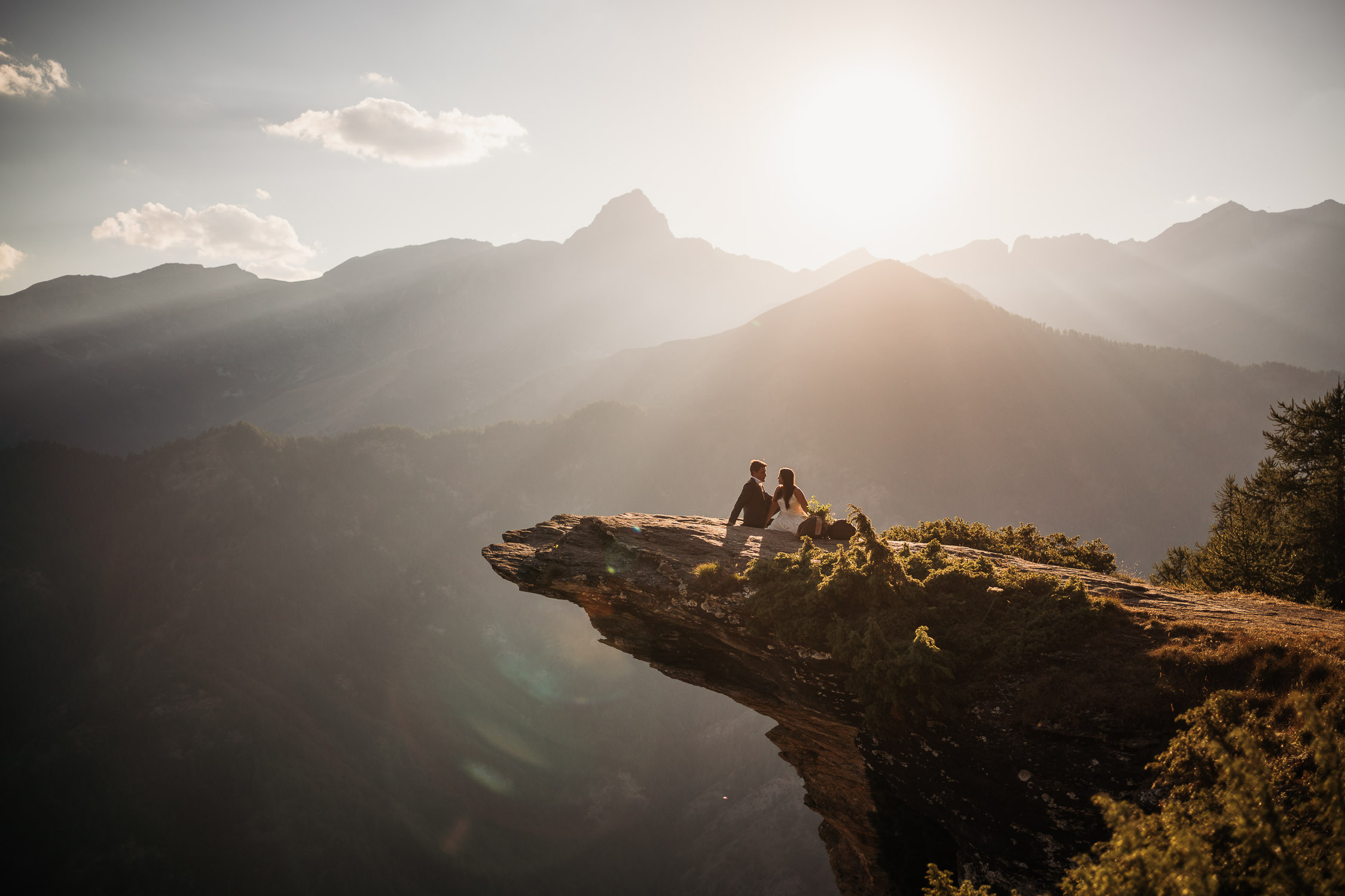 Italian Alps Elopement in Piedmont on a rock with view.