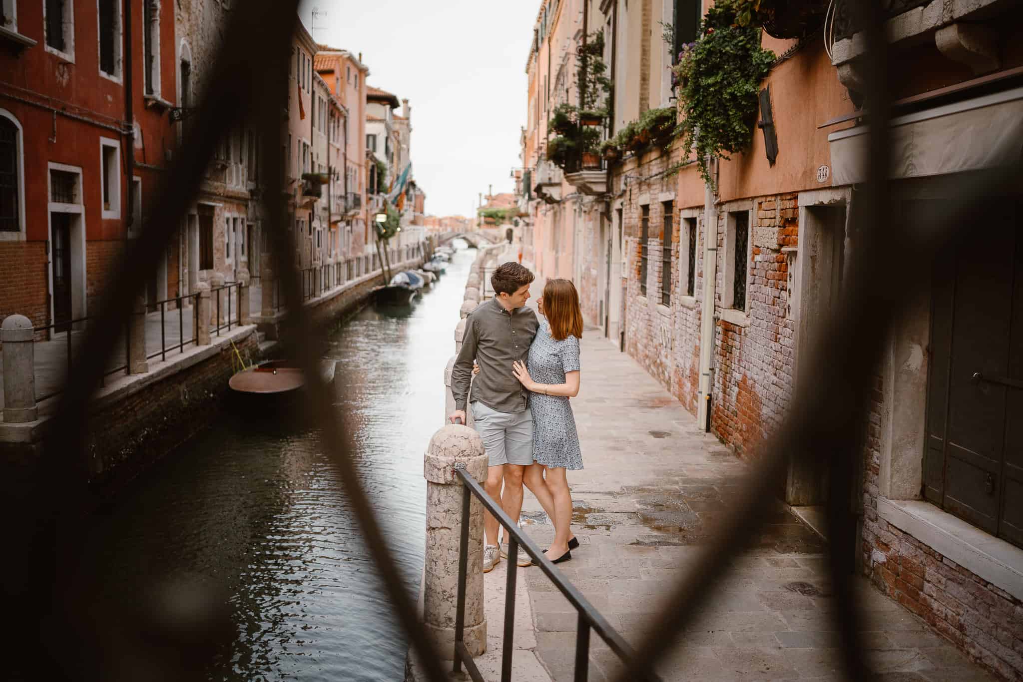 couple having their engagement photos taken in Venice