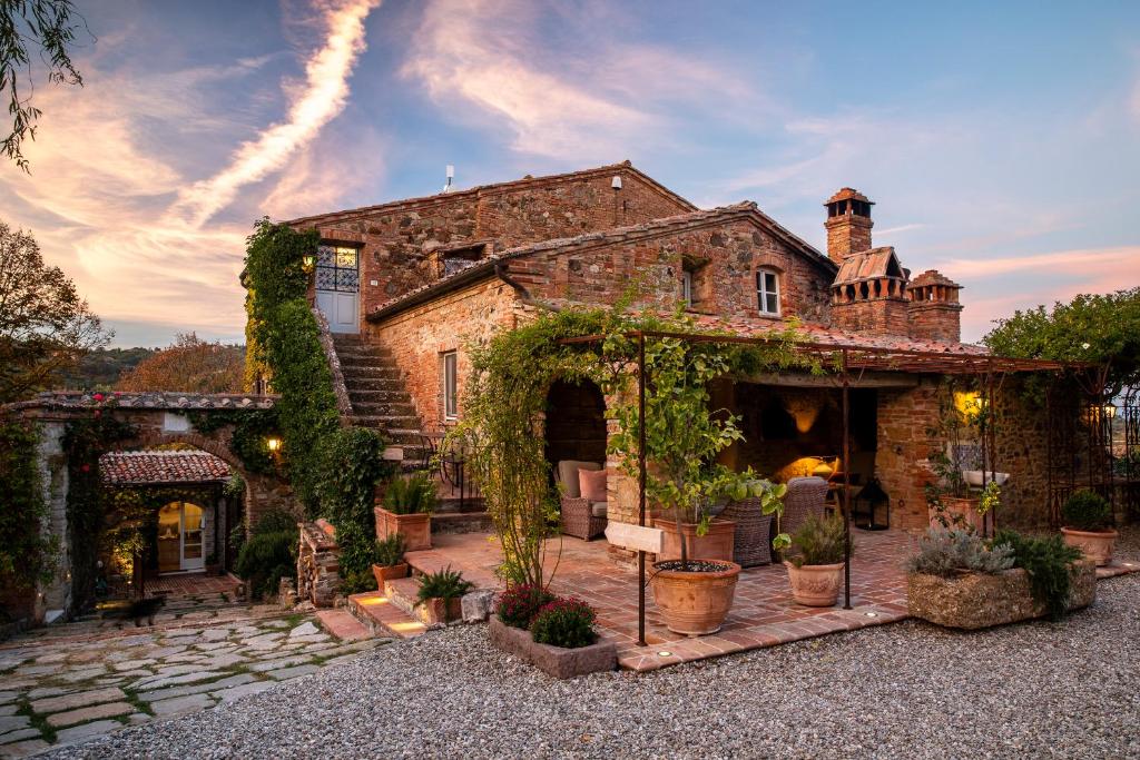luxury wedding venue in tuscany called lupaia, an ancient borgo on the tuscany hills.