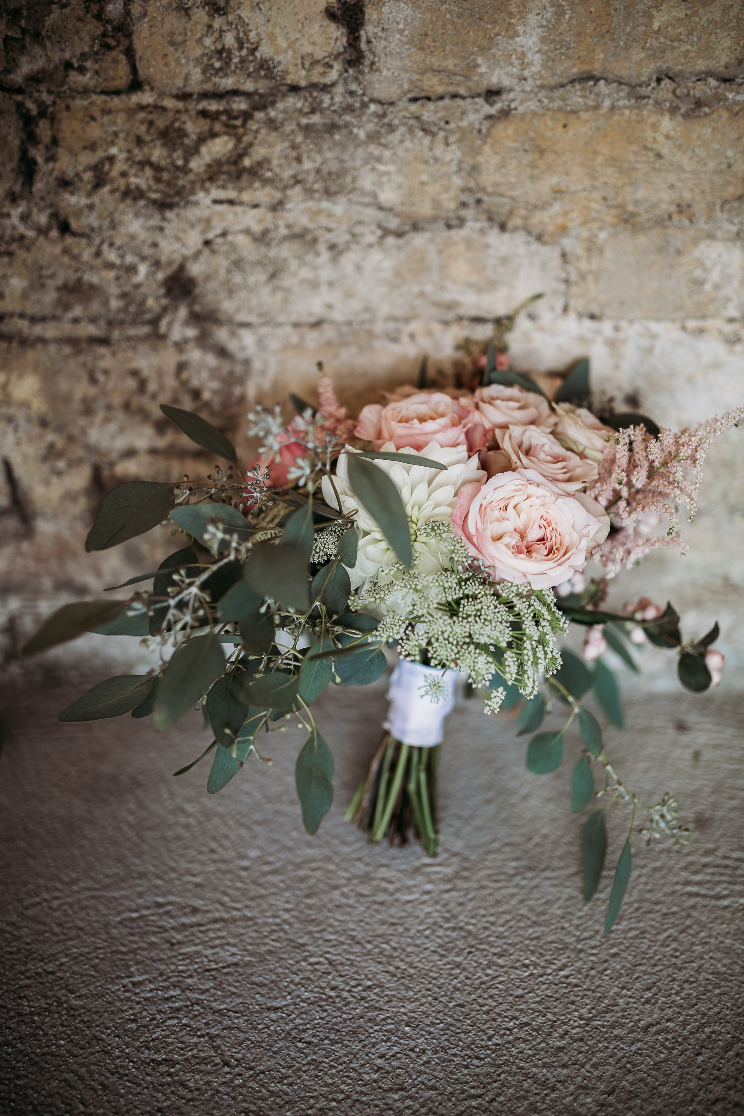 Pale pink peonies and white roses with eucalyptus for a romantica bouquet at La Villa Hotel